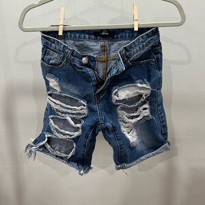 Ripped Bermuda shorts